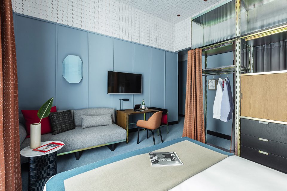 The hotel rooms are designed with Italian retro style