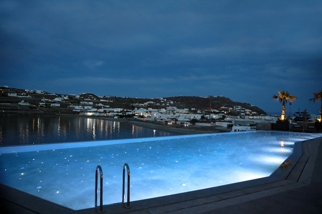 Night view design of outdoor swimming pool in Resort Hotel